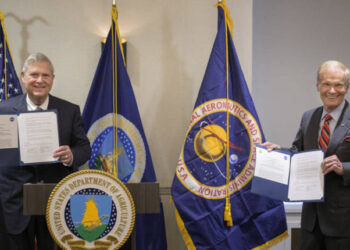 U.S. Secretary of Agriculture Thomas Vilsack, left, and NASA Administrator Bill Nelson, pose for a photograph after having signed a memorandum of understanding, Wednesday, June 21, 2023, at the USDA’s Jamie L. Whitten Building in Washington. The agreement strengthens the collaboration between the two agencies, including efforts to improve agricultural and Earth science research, technology, and agricultural management, as well as the application of science data and models to agricultural decision making.